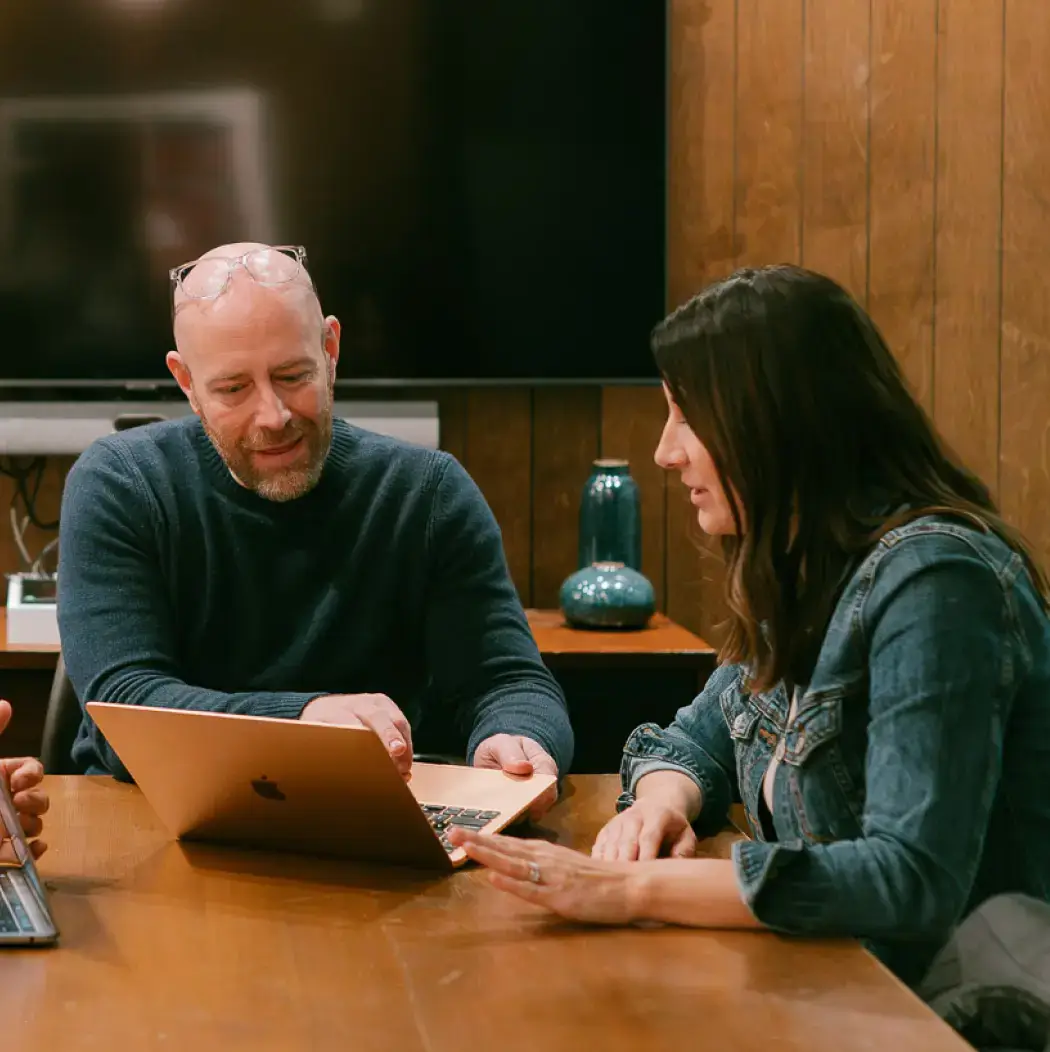 Jason and Morgan working on marketing strategy