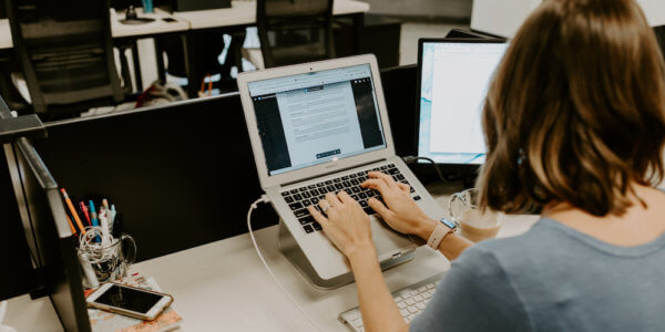 Best ways to announce the launch of your new website - working on computer