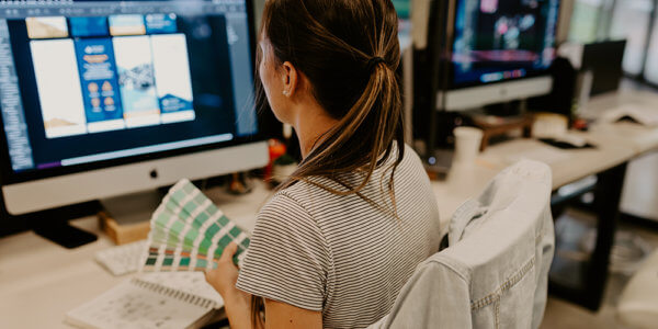 Lauren working on a website sharing signs of poor web design