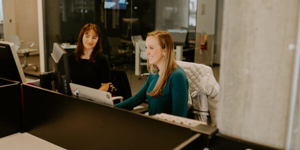 Tricia and Kate talking about continual improvement for the business