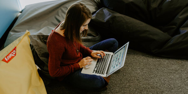 Morgan typing on computer things to stop doing in your marketing today