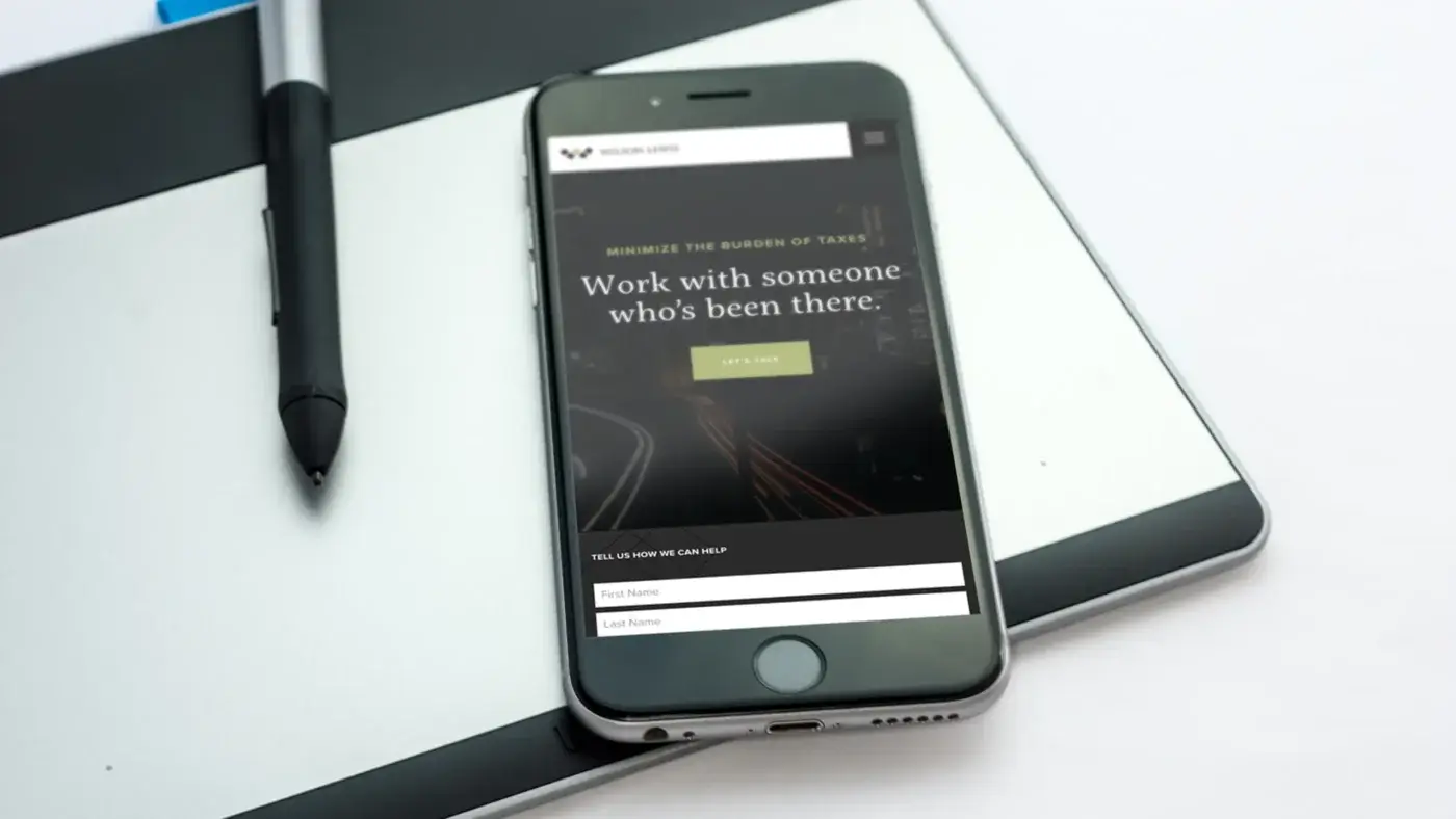 Wilson Lewis website shown on mobile device