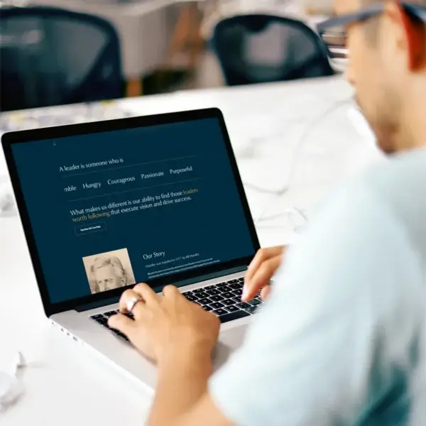 Looking at Handler website on a laptop computer