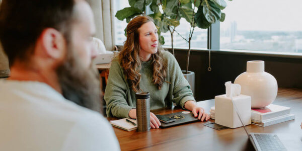 Audrey, Syrup Account Lead, in a business check in meeting
