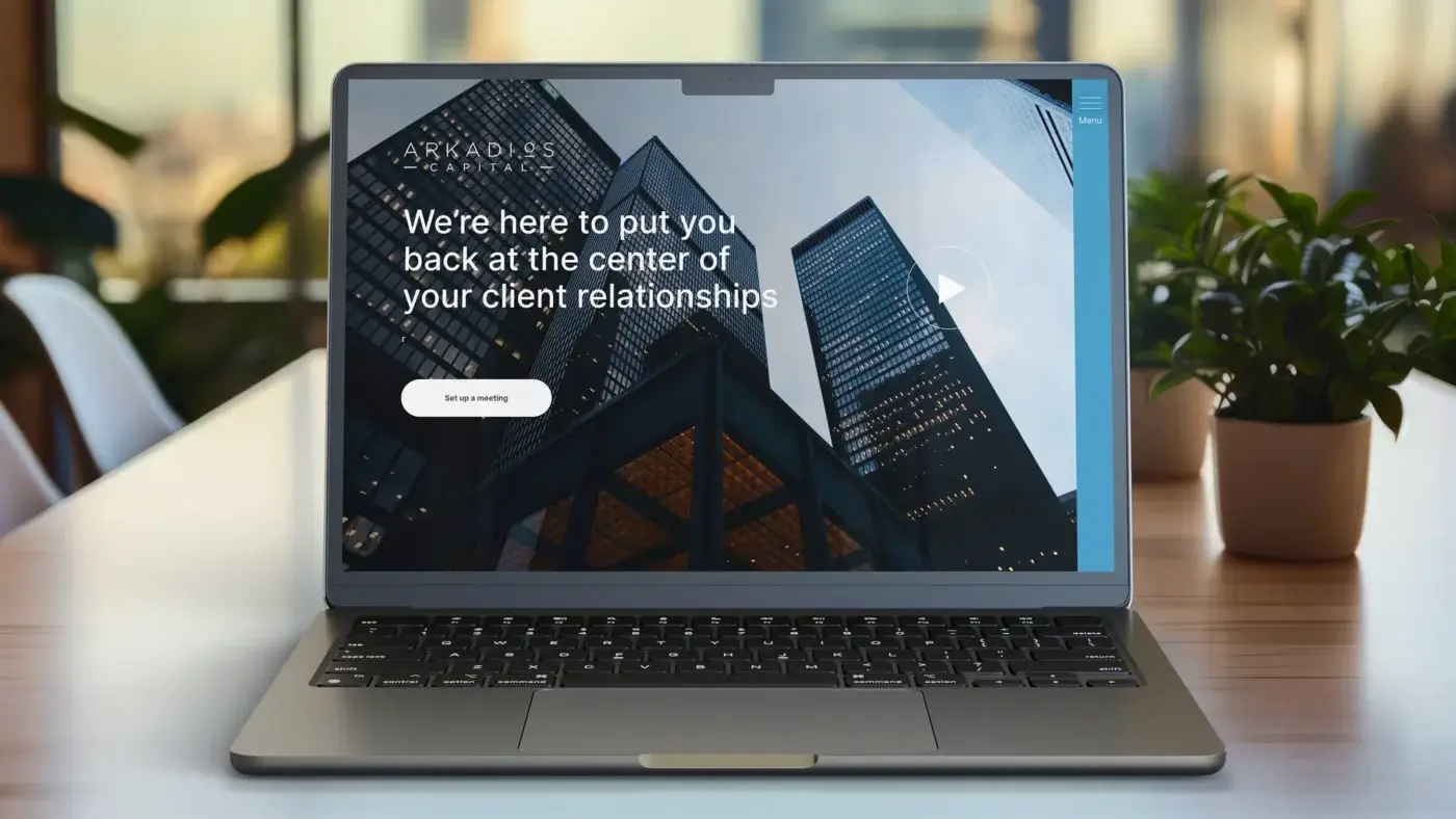 Arkadios website showing on a laptop computer