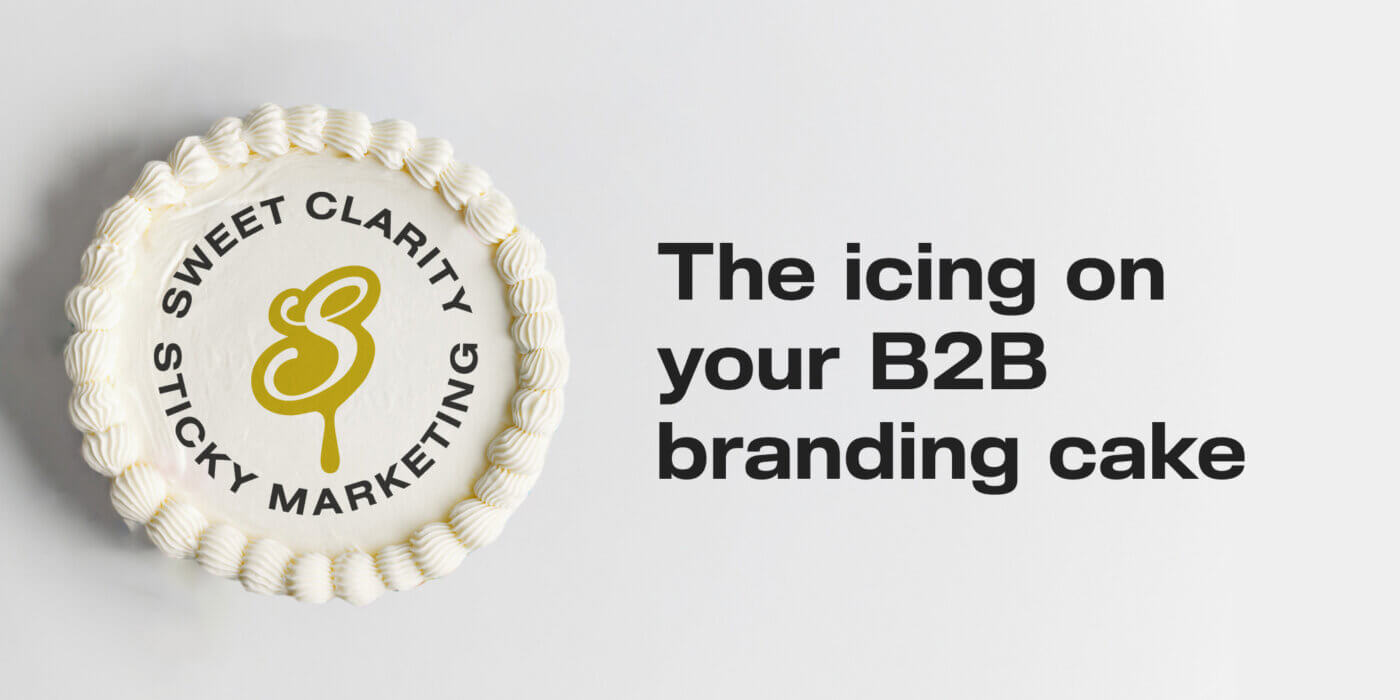 White cake with Syrup logo on it - The icing on your B2B branding cake