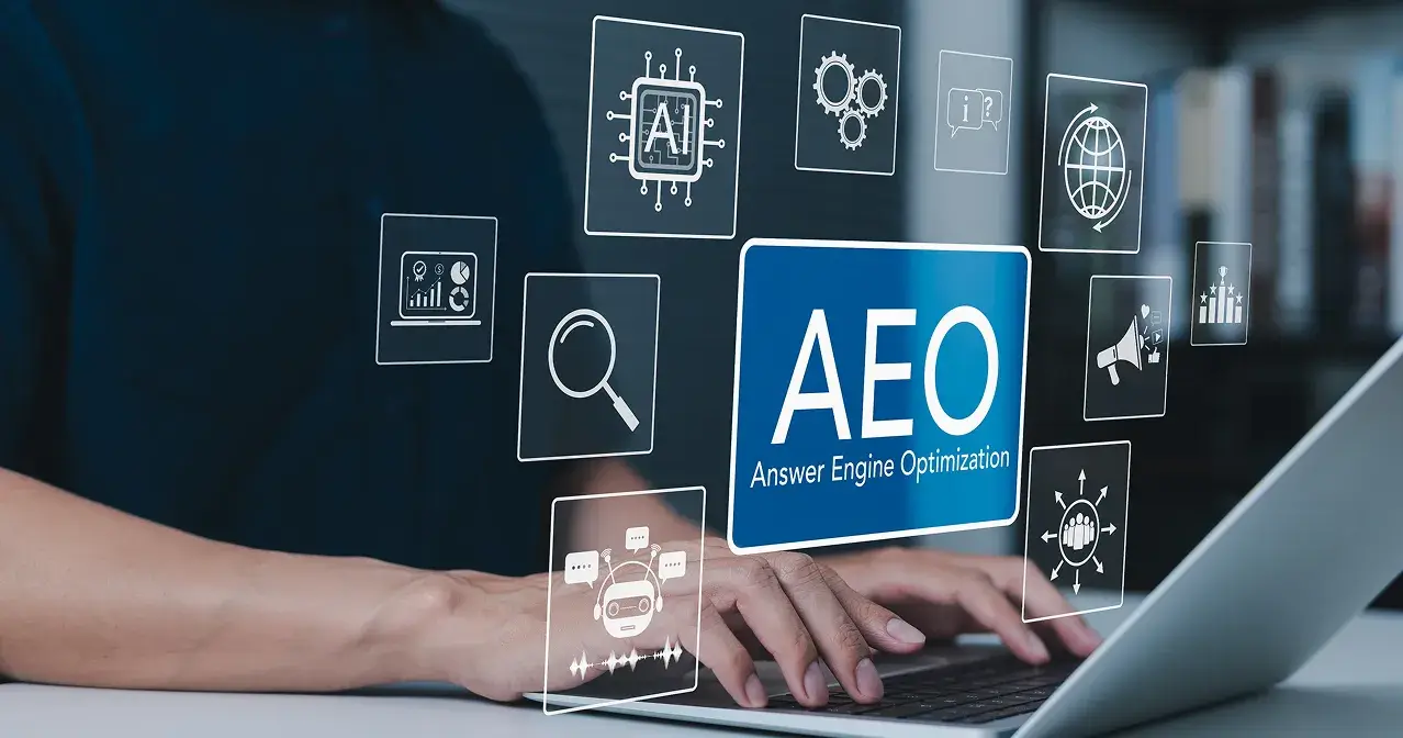 AEO with someone typing on computer