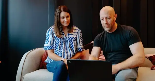 Morgan and Jason looking at computer talking about AEO in the B2B space