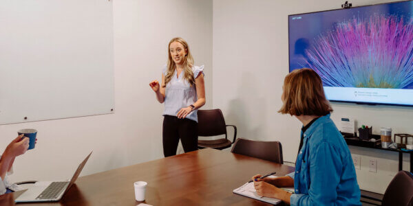 Kate sharing b2b messaging mistakes in front of the team